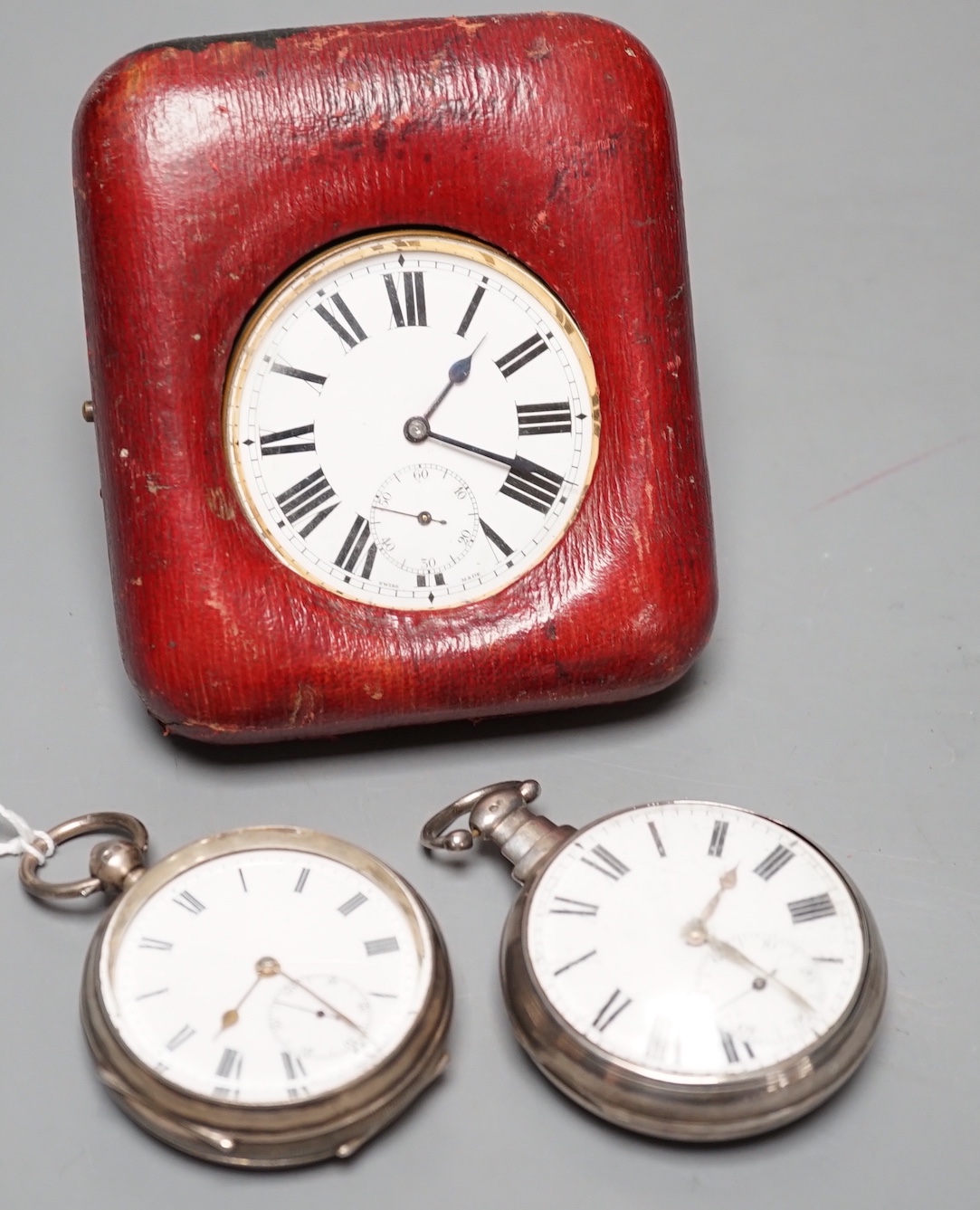 A George IV silver pair cased pocket watch by J. Levy & Son and two other pocket watches including one silver.